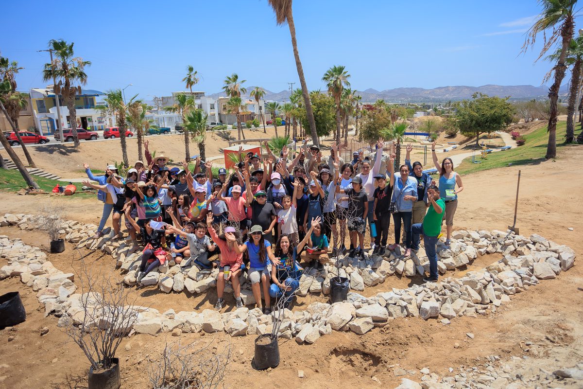 Community group around a completed green infrastructure installation in La Paz